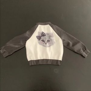 H&M windbreaker with kitten design on the back